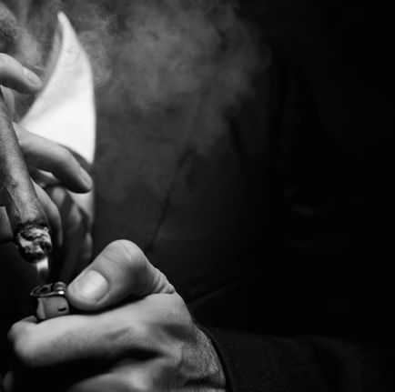 man smoking cigar