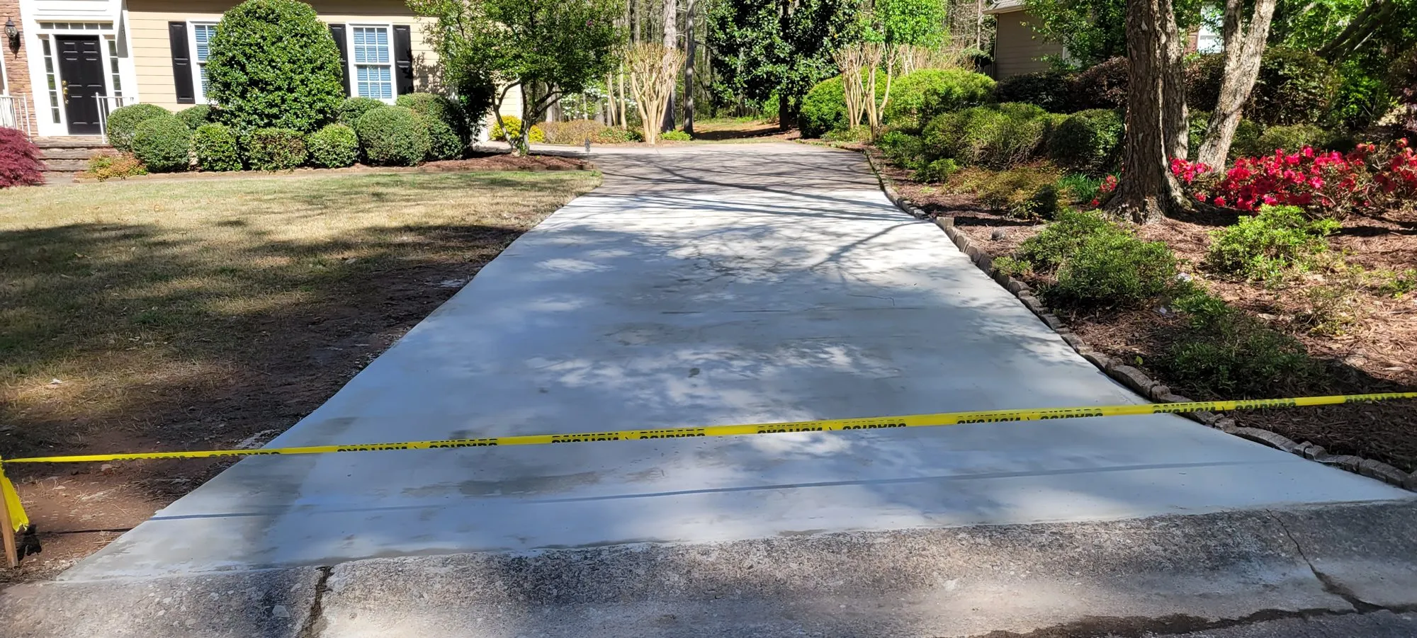 Driveway Repair Americus Ga A man and a tractor