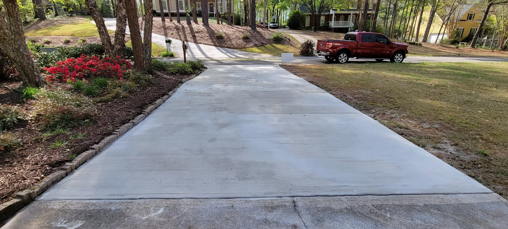 Driveway Repair Americus Ga A man and a tractor