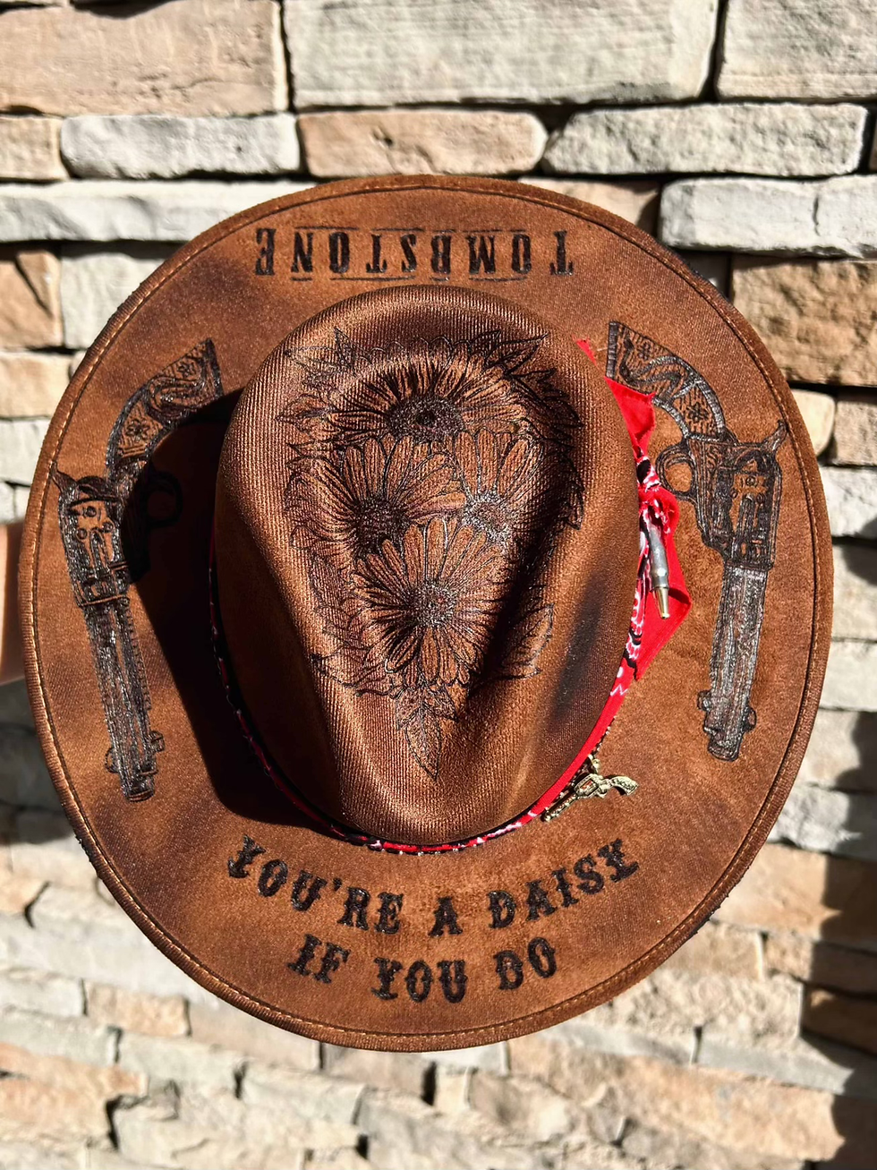 Thumbnail: "You're a Daisy if You Do" custom hand burned Tombstone film hat with guns and flowers from Happy Harvest Co..