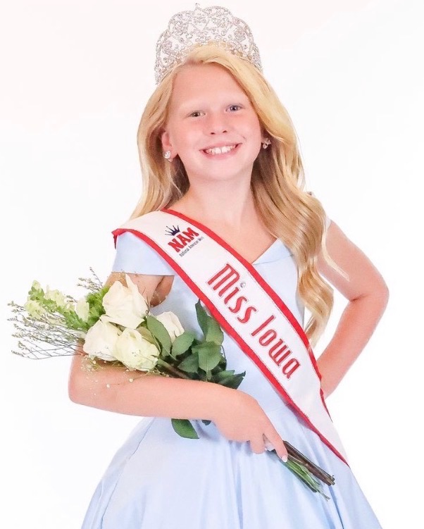 Elin wearing her crown and Miss Iowa sash