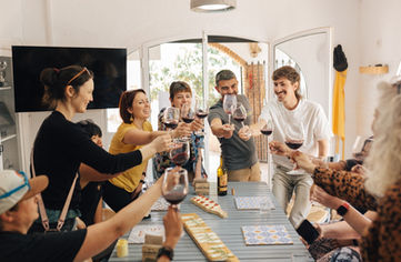 Enjoying local wine while participating in a goat cheese making workshop in Malaga, a memorable activity hosted at Rooral coliving