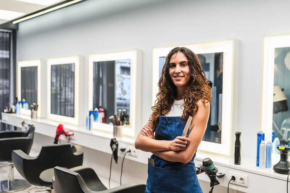 Salon owner standing in salon