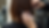 Close-up view of a stylist carefully applying hair colour to a client’s hair