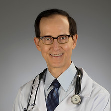 Dr. Martin whote coat headshot.JPG