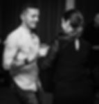 Couple dancing Salsa together smiling