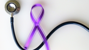 Stethoscope and purple ribbon on a white background, symbolizing health awareness. The ribbon is looped into an awareness shape.
