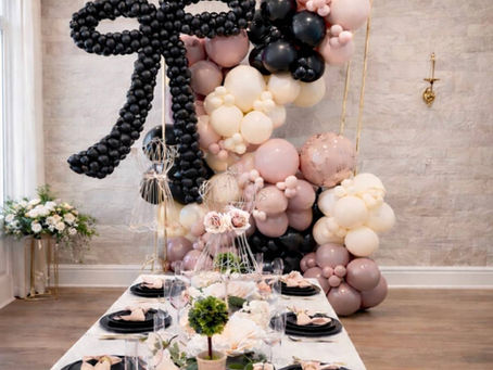 Balloon Garland and Tablescape with signature bow by Party and Co. Event Styling