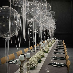 Modern Chic clear balloon installation with minimalist neutral tablescape in York Region