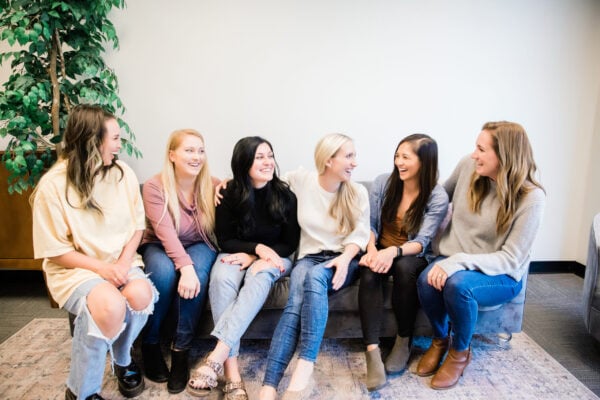 Group of Baby Sleep Consultants Sitting on Couch | The Peaceful Sleeper