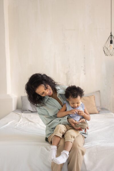 Mom and Toddler on Bed | The Peaceful Sleeper