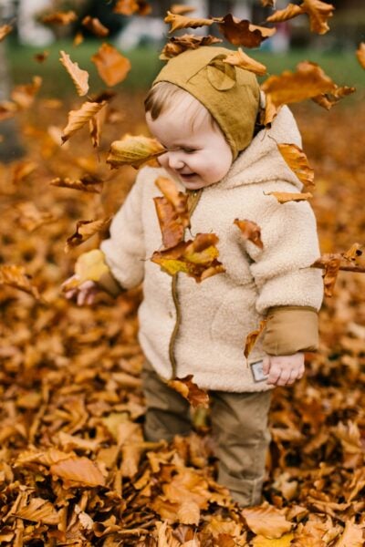 Baby Playing in Fall Leaves | The Peaceful Sleeper