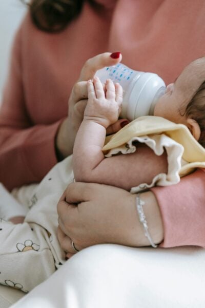 Mom Feeding Baby | The Peaceful Sleeper