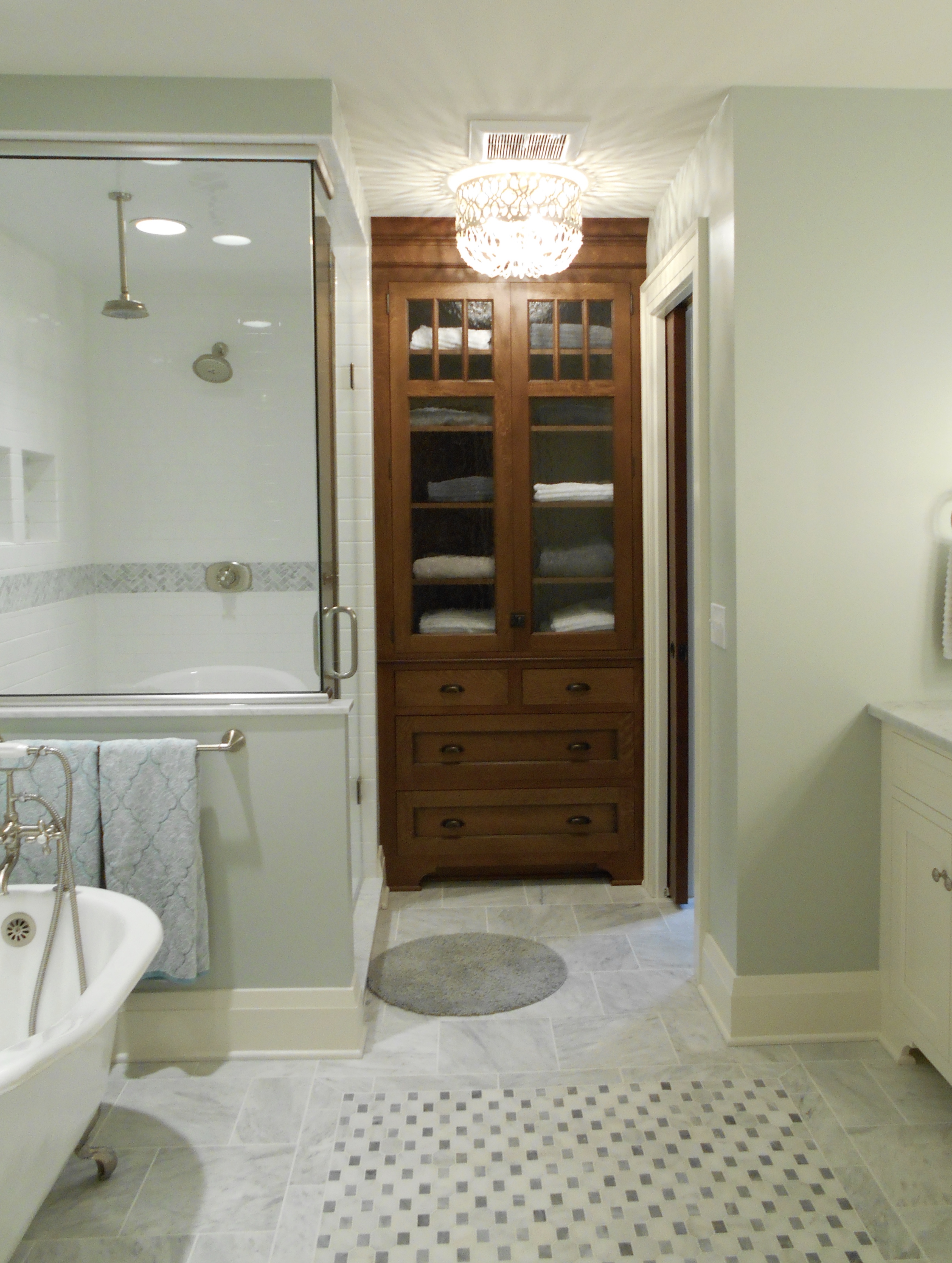 Shower and linen cabinet