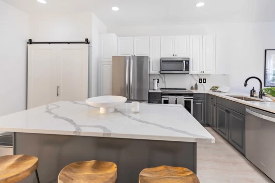 A bright kitchen with modern appliances in a condo downtown Delray Beach Florida
