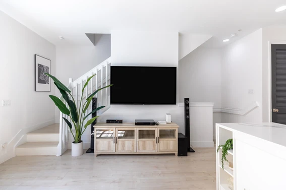 A bright white modern living room in a condo downtown Delray Beach Florida