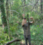 hanging a licking branch on a mock scrape