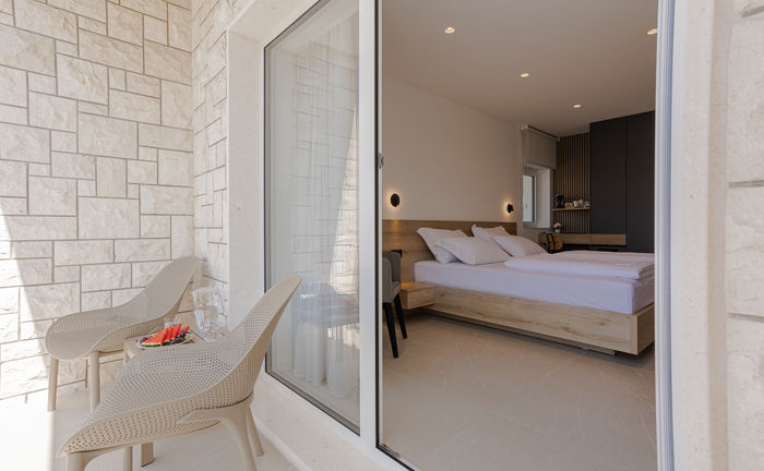 Room with balcony and sea view