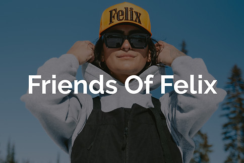 Artistic and stylish woman with orange hat standing in forest for Lucas Cullen's Friends of Felix portfolio. 