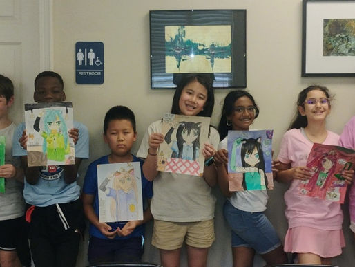 Summer camp kids display their work