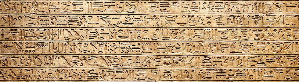Old Egyptian hieroglyphs on an ancient background Wide historical background Ancient Egypt