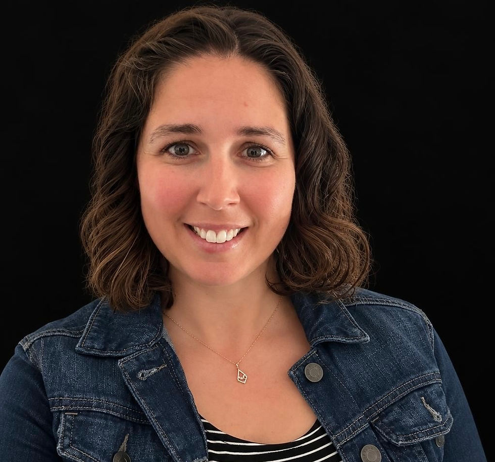 Smiling portrait of a certified trainer for the team.