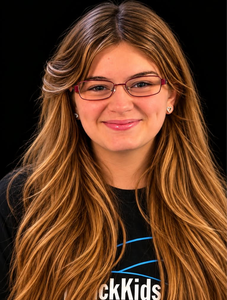 Smiling female certified trainer with long hair and glasses