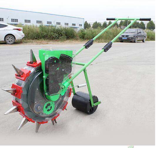 Thumbnail: Hand Push Corn Wheat Maize Peanut Seeder Manual Sowing Machine