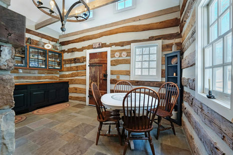 dining room table in log home at hideaway springs farm