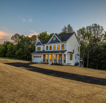 Americus Manor Exterior at Twilight from PDR Homes