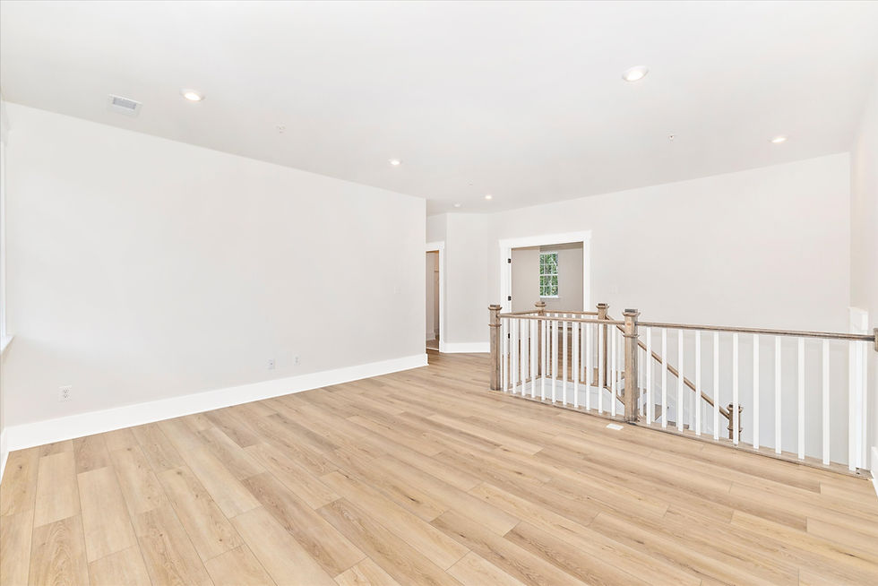 Staircase and upper landing in Athens model home