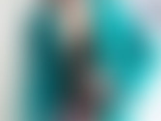 Il cappotto color Tiffany: come indossarlo di giorno e di sera