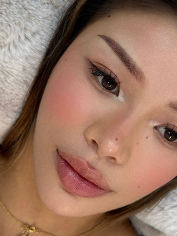 Cosmetic tattoo brows in North Sydney featuring soft, natural-looking brow enhancement with precise shaping, balanced symmetry, and long-lasting definition. Lip blush cosmetic tattoo in North Sydney showcasing enhanced lip colour, improved definition, and a soft, natural tint for a fresh and youthful appearance.