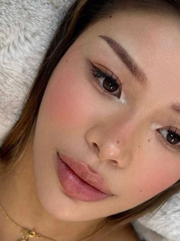 Cosmetic tattoo brows in North Sydney featuring soft, natural-looking brow enhancement with precise shaping, balanced symmetry, and long-lasting definition. Lip blush cosmetic tattoo in North Sydney showcasing enhanced lip colour, improved definition, and a soft, natural tint for a fresh and youthful appearance.