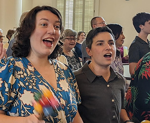 Parishioners singing in the Meetinghouse during worship