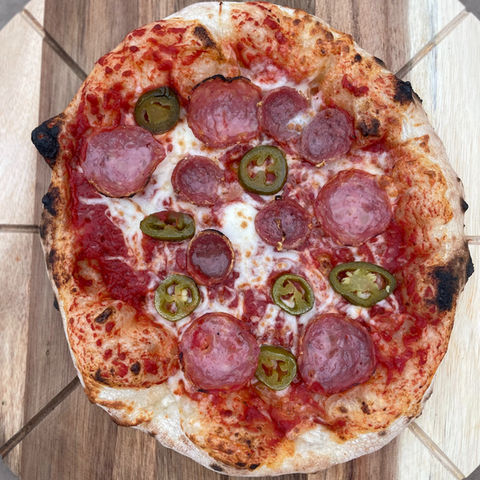 Pepperoni, salami, and jalapeno pizza