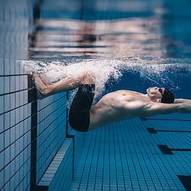 A swimmer swimming after overcoming fear of swimming