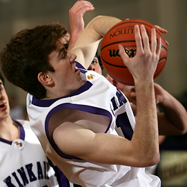 Basketballer saving a ball from scoring with an agile mindset