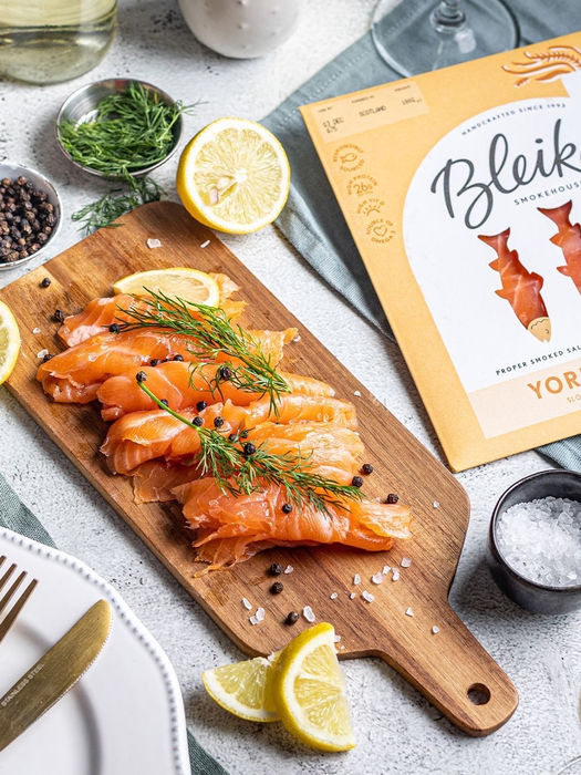 Plate of food photography smoked salmon with menu and ingredients around, local Bristol photographer in studio for a seafood restaurant