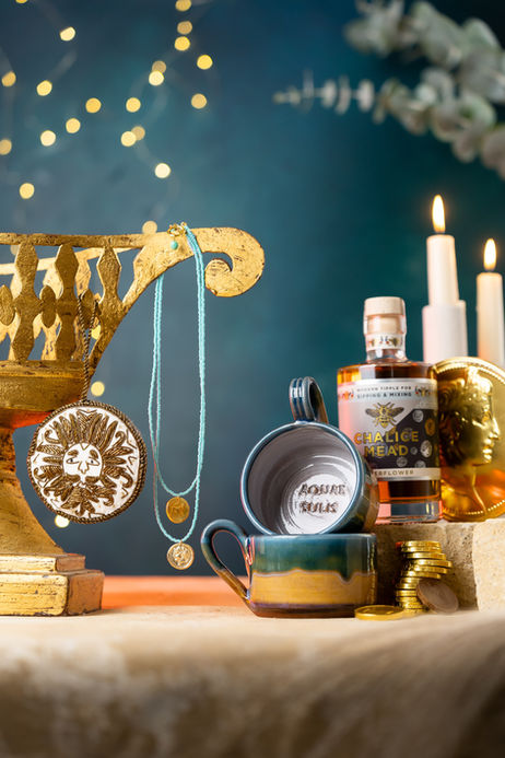 professional product photography of various homeware items on a blue background with fairy lights. Shot by Future Proof Bristol Photography Studio 