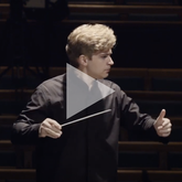 HK conducts Mozarteum Orchestra.png