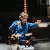 Henry Kennedy conducting an orchestra