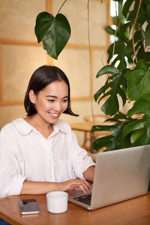 smiling-female-manager-freelancer-student-sitting-with-laptop-cafe-working-typing-compu.jp