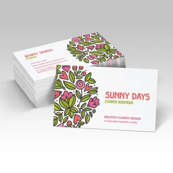 Business cards for Sunny Days Flower Boutique with pink and green floral designs.

