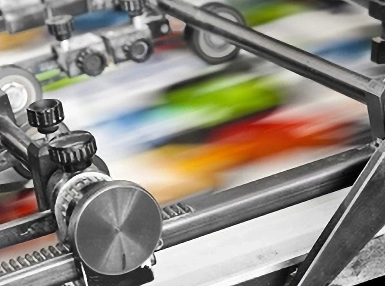 Offset printing press in action