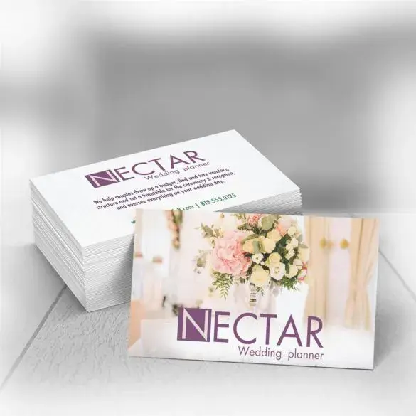 Alternative wedding planner business cards with soft floral designs.

