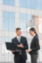 businessman-businesswoman-talking-each-other.jpg