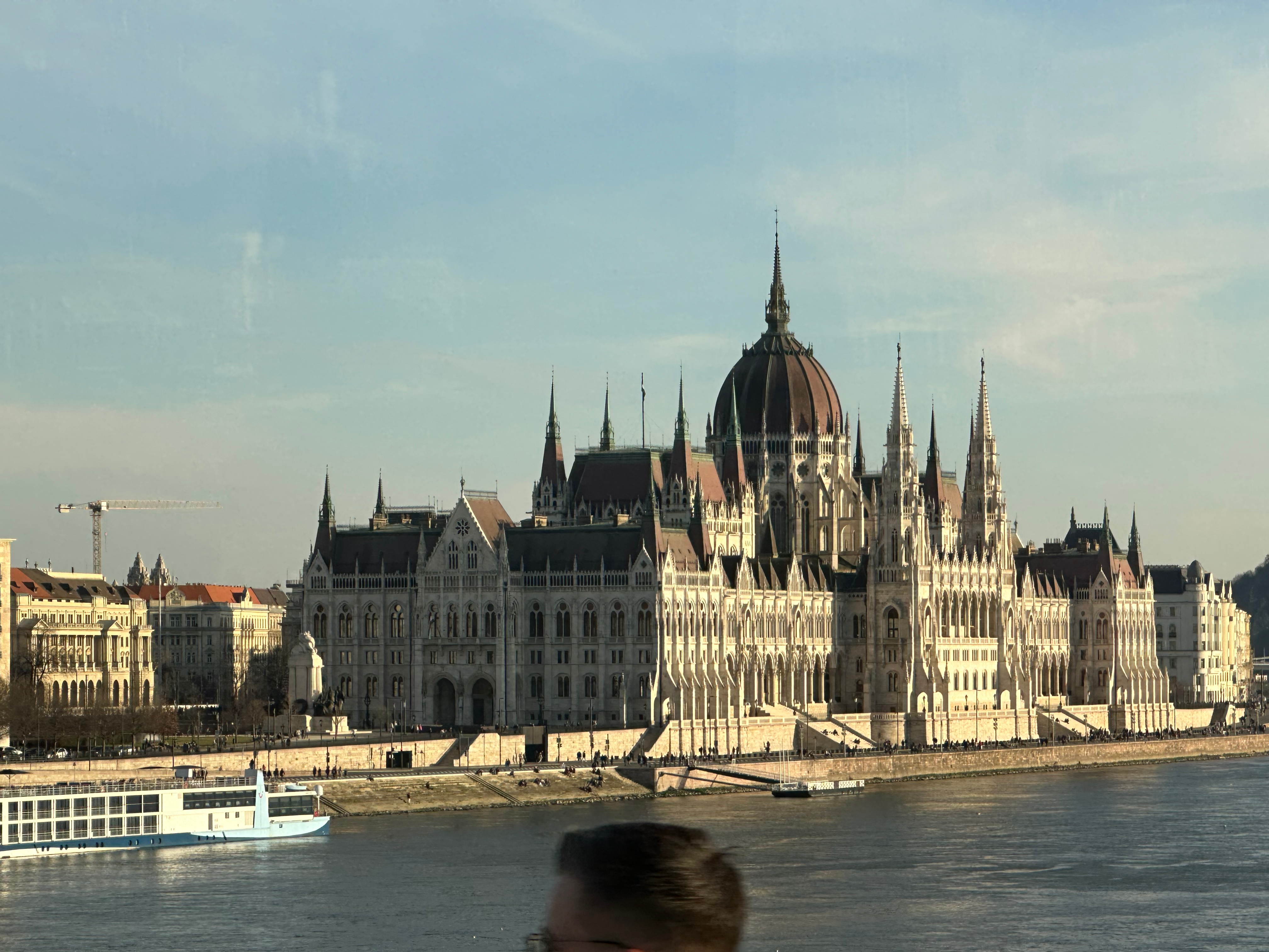 Vienna opera house lit at night on a Danube river cruise