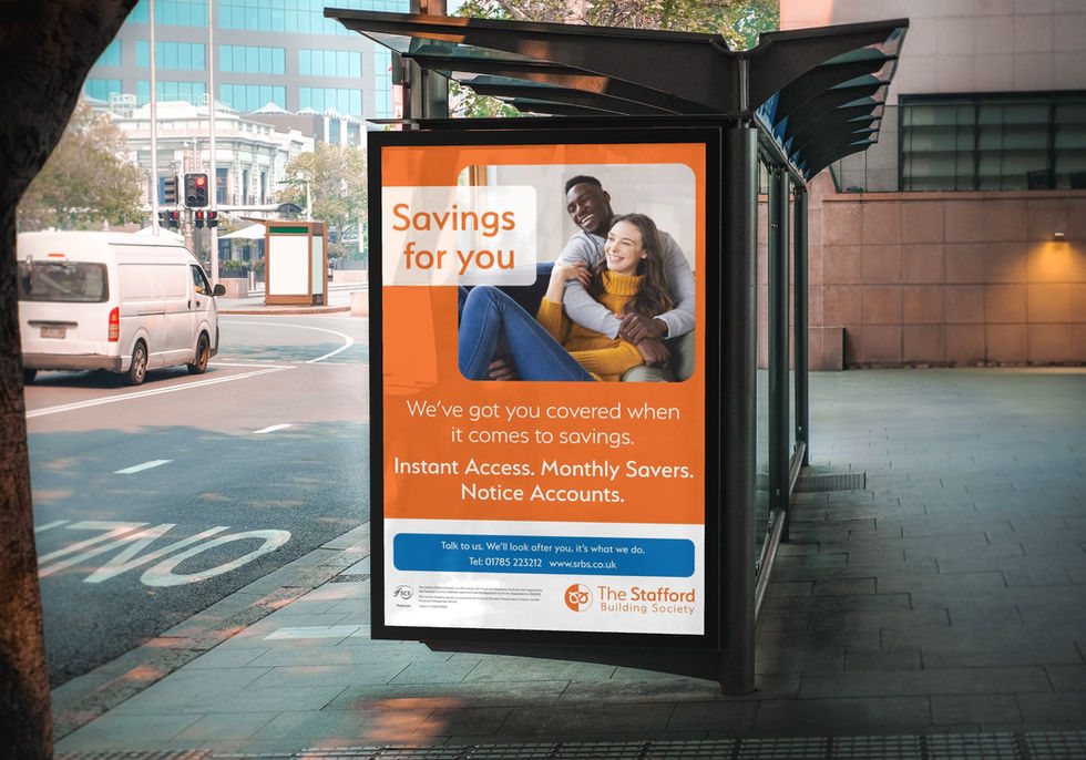 The Stafford bus stop advert on a road