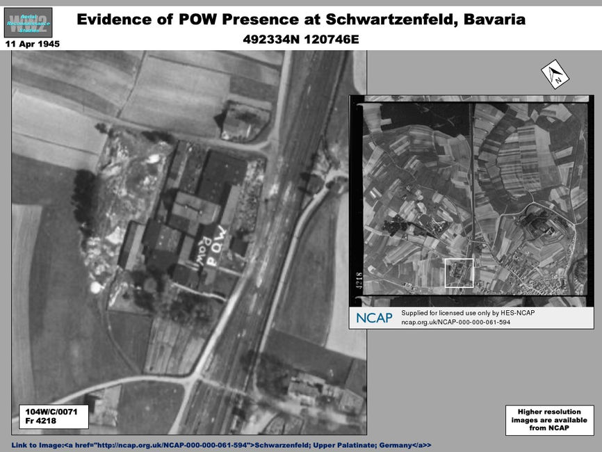 aerial photo of POW written on roof of building in Bavaria